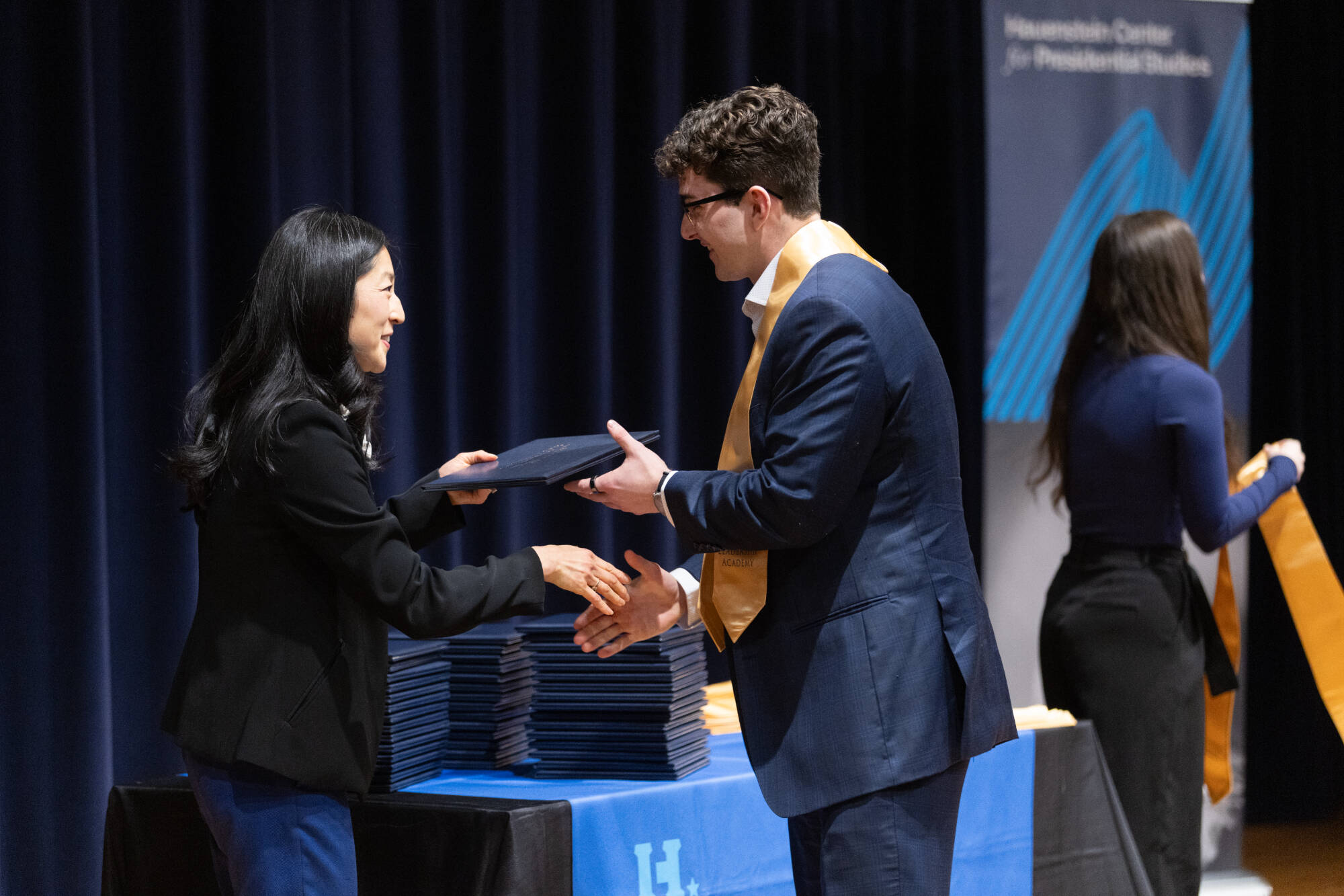 student presented with CLA certificate